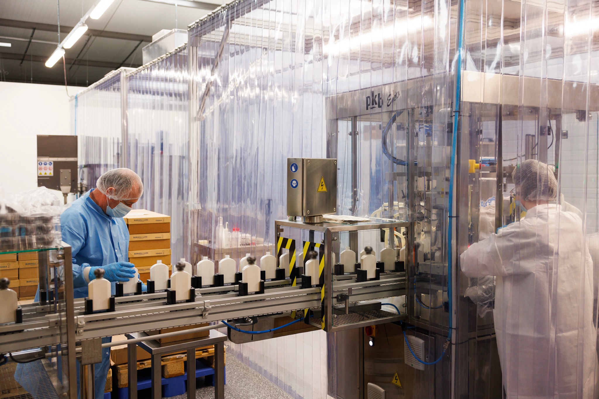 Bottle filling and packaging line, Biocreation Cosmetic